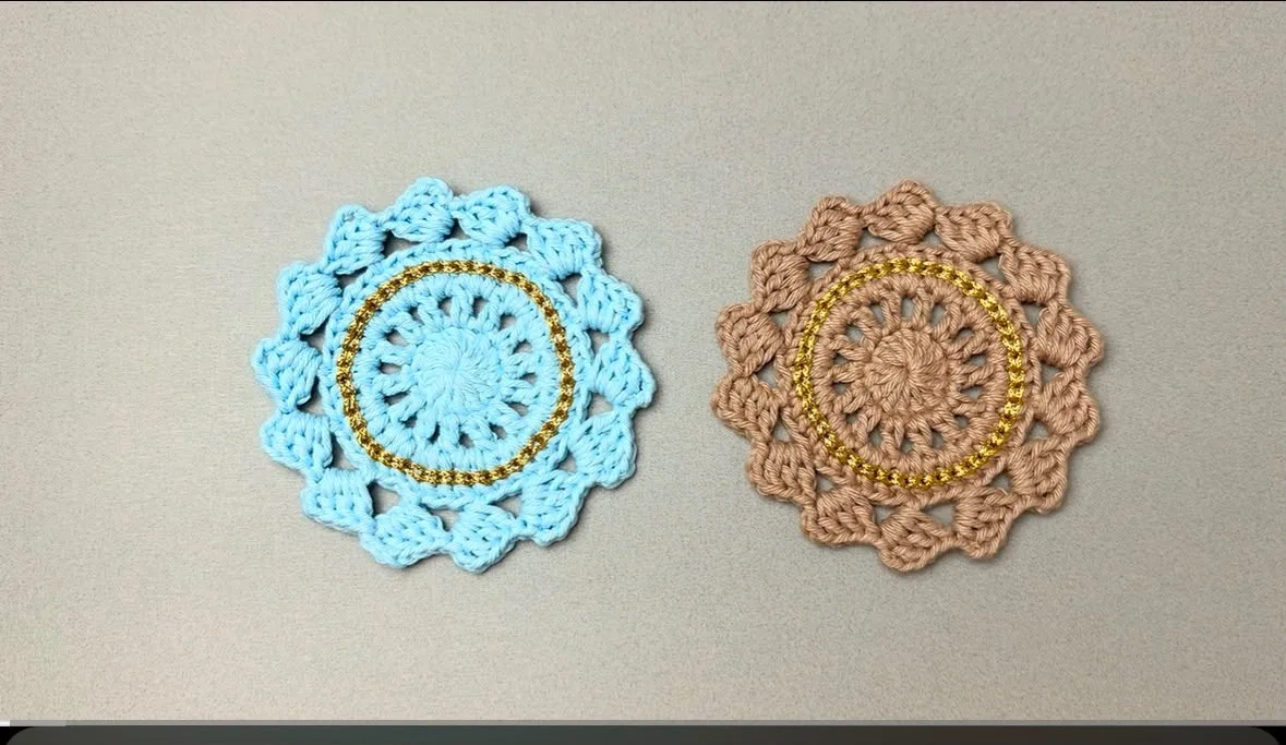 Golden ring coasters Golden ring coasters, handmade crochet by Atelier Annamaria. Light blue and caramel coasters with a golden ring.